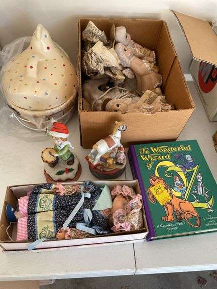 Lighted, angel nativity, pop-up book, doll, music box, figurines, and covered Easter hen.