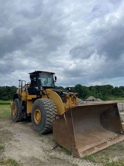 2014 CAT 980 K wheel loader 18,452 hours showing on meter. Cat ID CAT0980KVW7K02430. Serial number W7K02430.Engine serial number TXM06203. Approximately 369 hp. Diesel engine. Cab/ROPS. Includes scale, reader with printer, located in cab see photos for detail. AC blows Ice Cold. See Photos for Video of Equipment in Operation.- $1000 deposit. balance in ACH or certified check within 48 hours of auction close- NO Sales Tax Collected