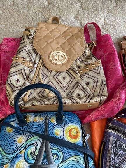 Nice lot of ladies, purses, including designer backpack.
