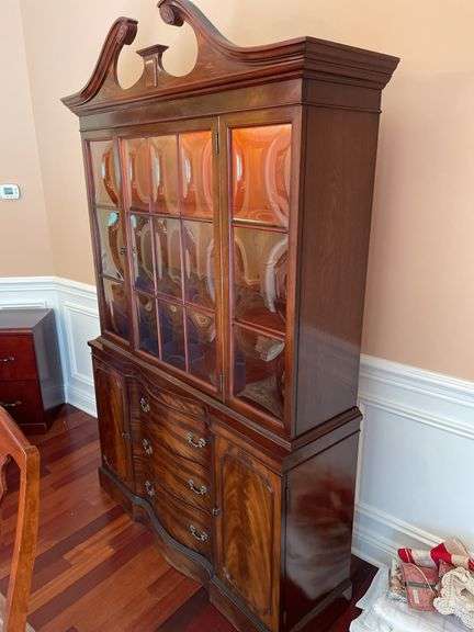Dining room. Ebert furniture company glass China Cabinet, very high quality. 52 inches wide 80 inches tall. With light inside in good condition Cherrywood finish.