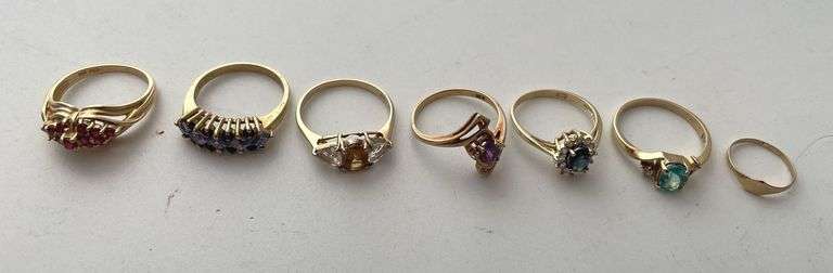 (7) rings, engraved 10 K. Some with semi precious stones. Total weight 13.7 g.