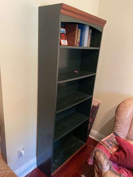 Den. Bookshelf. Green finish; Approximately 73 inches tall and 30 inches wide. Well made and contains a few classic books.