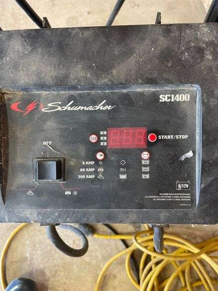 Schumaker SC1400 Battery Charger & starter. Excellent well made unit we used this several times. Cannot be removed until end of scheduled pick up