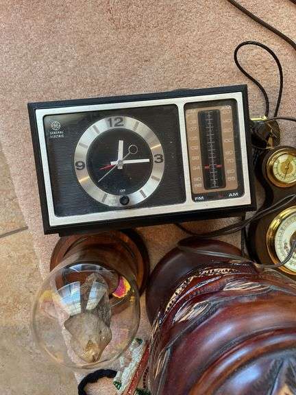Cool decorative lot includes brass bookends, duck, barometer, vintage radio.