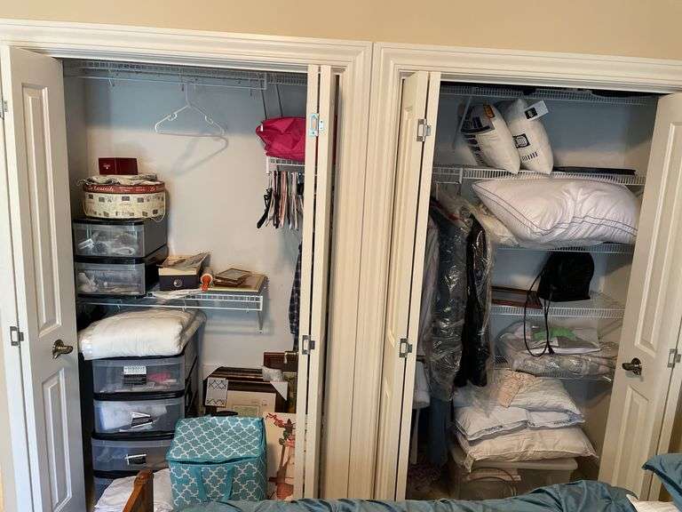 Contents of closet in children’s bedroom. Includes framed prints. Pillows. Some clothing. Fans, craft items, Miscellaneous.