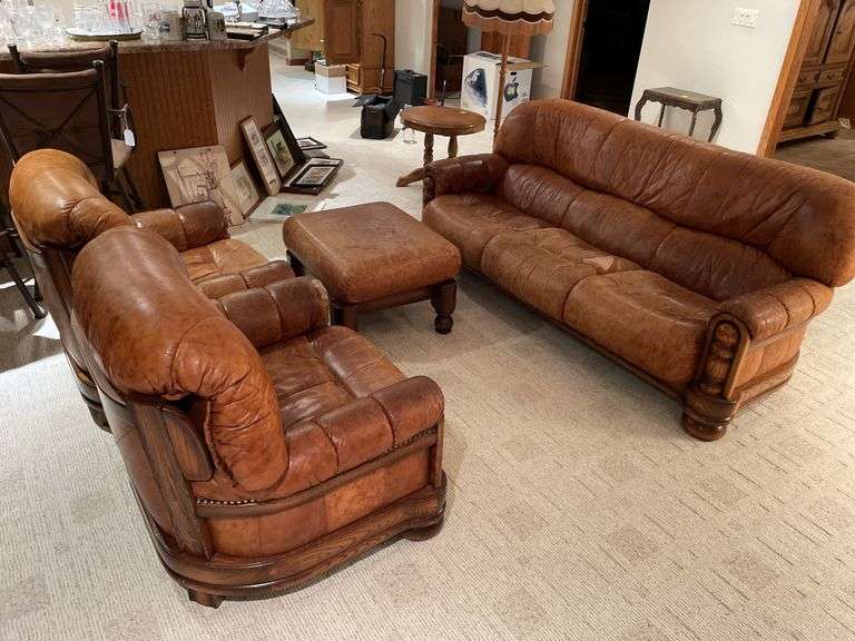Basement. Assuming Ligne Mur. Well-made leather furniture, set sofa two side, chairs and ottomans. (One ottoman found later not pictured) Some Loss review the photos. But high quality furniture set.