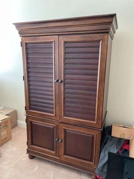 Living room. Entertainment cabinet. 78 inches tall 43 inches wide 25 inches deep.