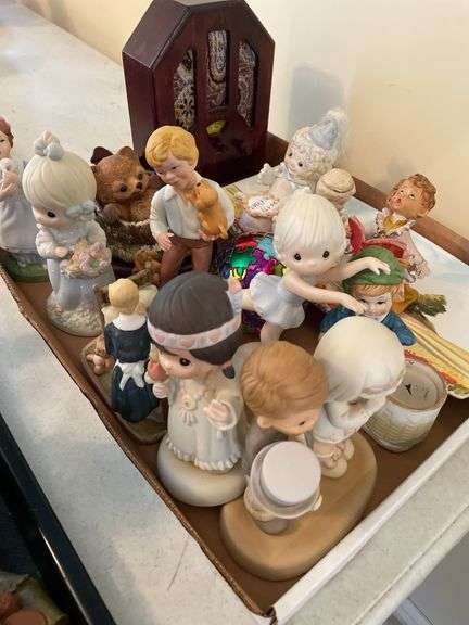 Entryway. Figurine lot featuring precious moments.