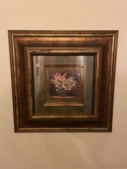 First floor half bath. Four framed art pieces.