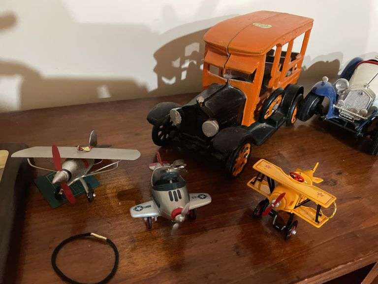 Basement. Lot of collectible cars, and planes.