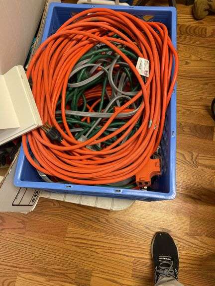 Lot includes plastic table, fire extinguisher, miscellaneous extension, cords, and lightbulbs