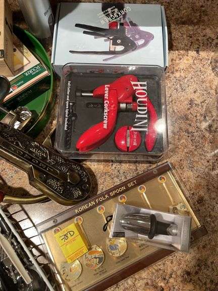 Basement. Flatware, cork screws, barware miscellaneous items.