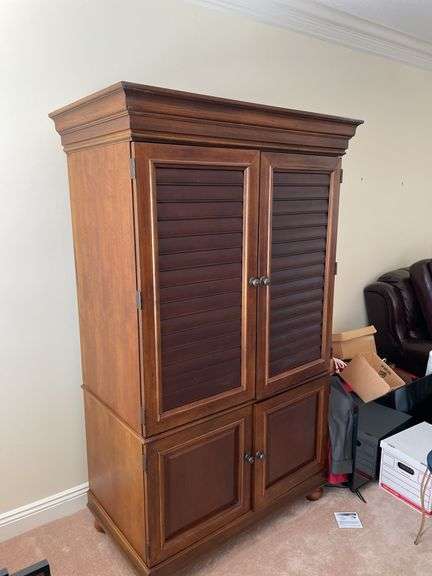 Living room. Entertainment cabinet. 78 inches tall 43 inches wide 25 inches deep.