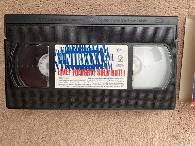 Living room. Lot of Nintendo games. Featuring Mario. Simpsons. Other unique and classic titles. Includes VHS of Nirvana live tonight sold out.