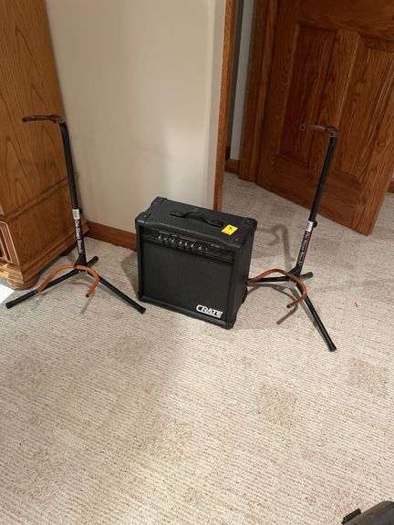 Basement. Create GX – 20 M practice amp with two on stage guitar stands.