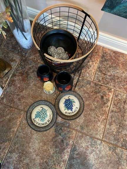 Sunroom. Lot of decor. Vases. Unique baskets and plates. With framed print.