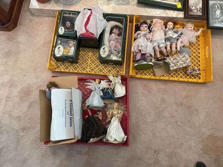 Living room. Large lot of dolls. Including Geppetto. Bisque face dolls. JFK’s son doll and a cherished Teddy.
