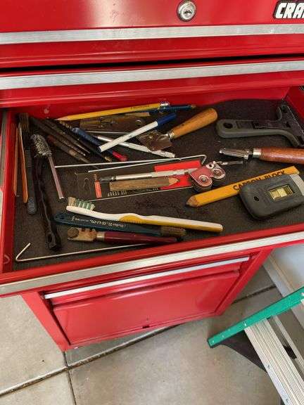 Craftsman rolling tool cabinet with a few miscellaneous tools