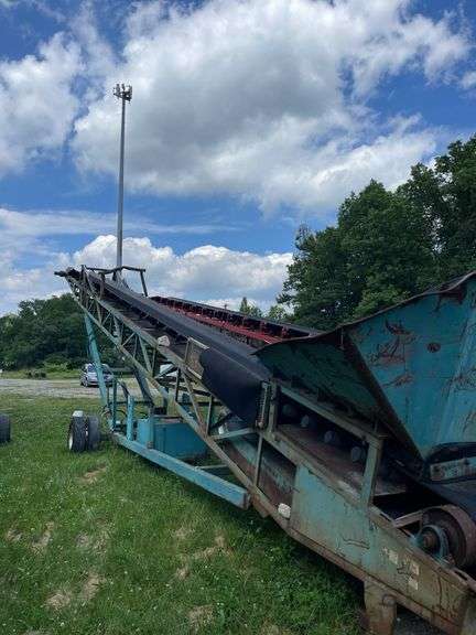65 foot non-engine hydraulic powered portable, wheeled aggregate conveyor. -$1000 deposit. balance in ACH or certified check within 48 hours of auction close