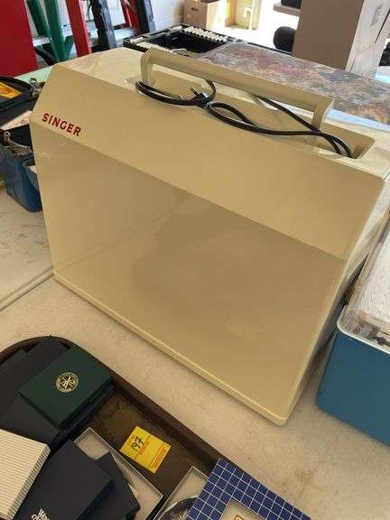 Sewing machine, sewing box and sewing essentials