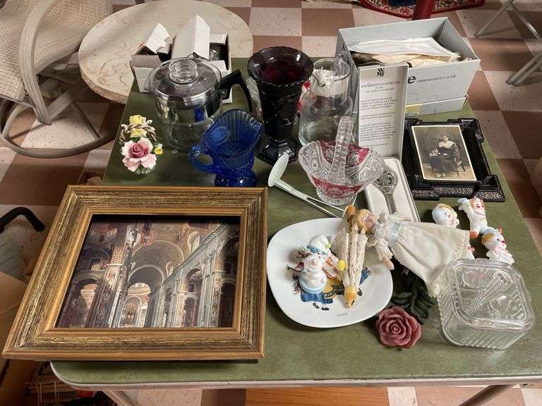 Table top of vintage items includes coffee maker, shadowbox, take what you want leave the rest.