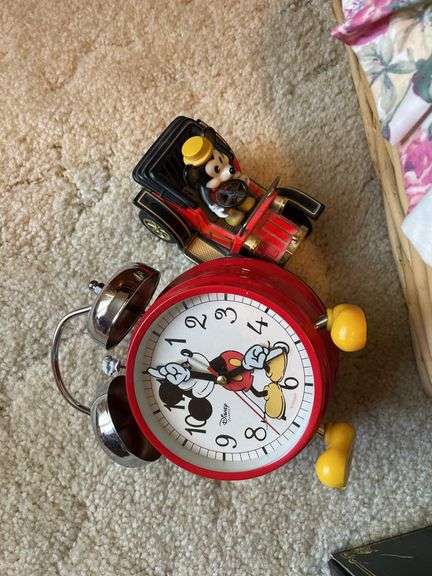 Bedroom. Wonderland classical piano in box. Mickey Mouse clock in toy with doll and basket.