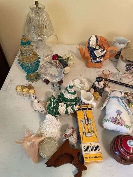 Then. Enormous lot of decor pieces. Treasures abound. Entire table top.