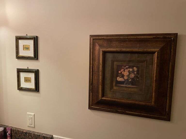 First floor half bath. Four framed art pieces.