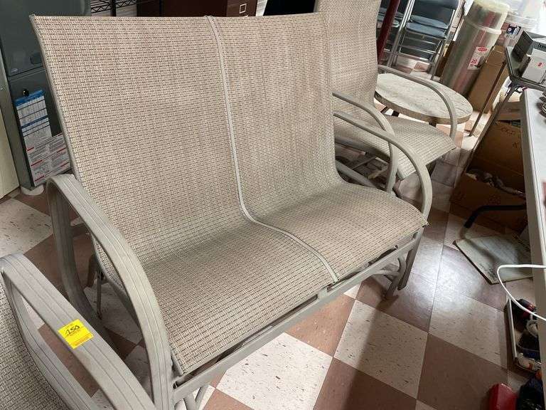 Nice outdoor set includes two rockers and glider and small resin table. Basement.