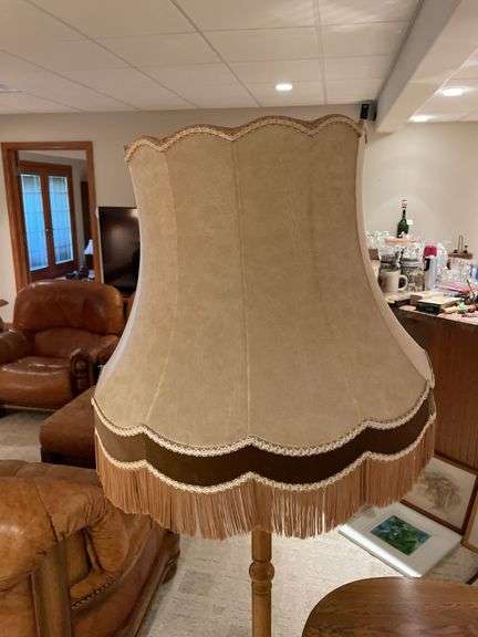Basement. Wooden base standing lamp and matching small side table approximately 24 inches tall.