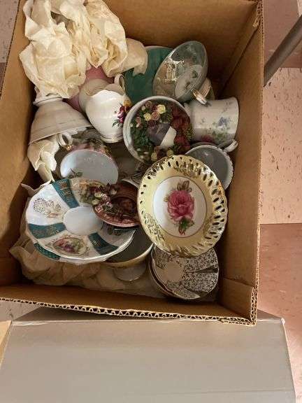 Lot of collectible tea, cups, and vintage items