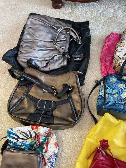 Nice lot of ladies, purses, including designer backpack.