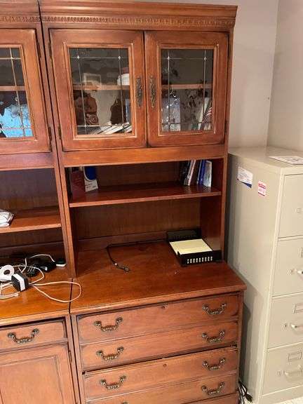 Three-piece L-shaped office set with hutches. Some loss but high quality. Easy load out through walkout basement.