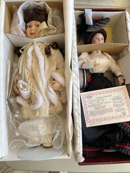 Two collectible dolls, boxed.