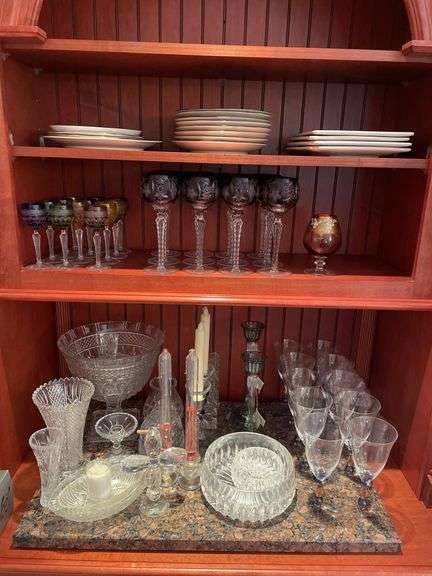 Dining room. Large lot of high quality crystal Stemware. Miscellaneous plates.