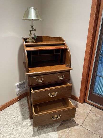 Newer tamber door secretary with brass desk lamp. Easy loadout.