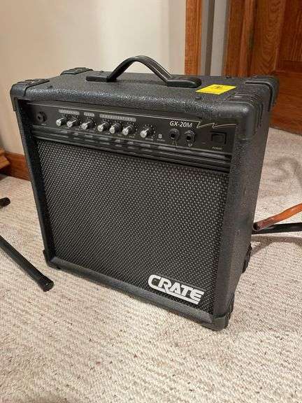 Basement. Create GX – 20 M practice amp with two on stage guitar stands.