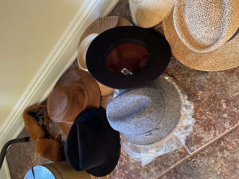 Entryway. A collection of hats.