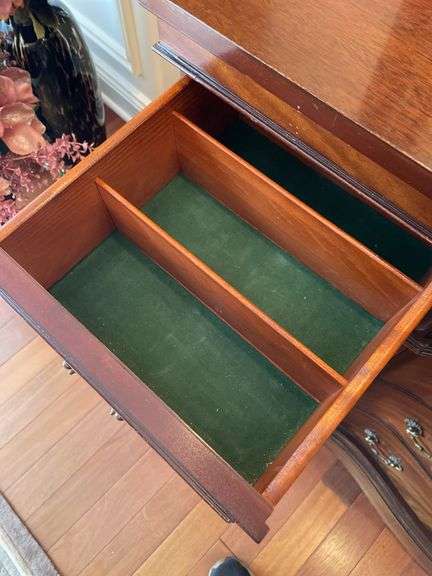 Dining room. Ornate Cherrywood finish 62 inches long 35 inches high 20 inches deep. Burl front veneers.  Not marked but assume same company as china cabinet.  One handle was missing.