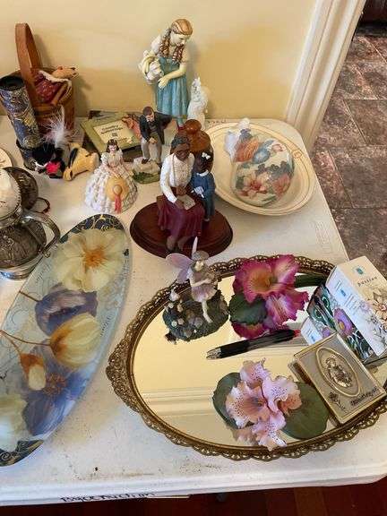 Then. Enormous lot of decor pieces. Treasures abound. Entire table top.