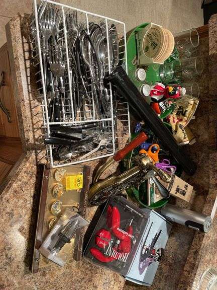 Basement. Flatware, cork screws, barware miscellaneous items.