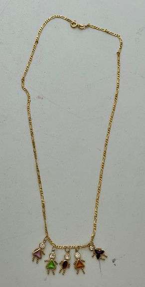 Birthstone necklace. With five attached charms. Clasp is engraved 14 K. Total weight 5.8 g.