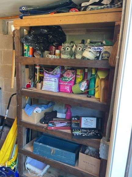 Remaining contents of garden room, not including shelving or wooden ladder. Chemicals, tools, tarps, metal, folding chairs, firewood, kitty pool. Take what you want leave the rest.￼