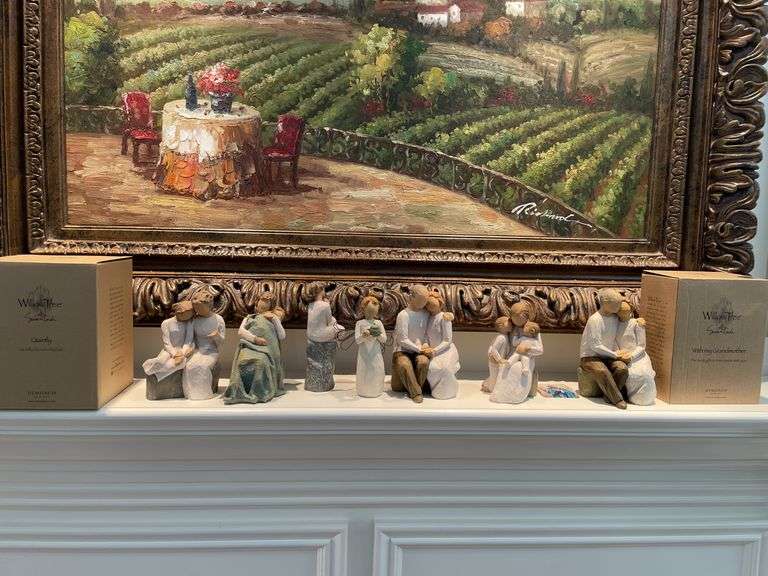 Living room. A collection of Willow tree figurines. Some have original boxes.