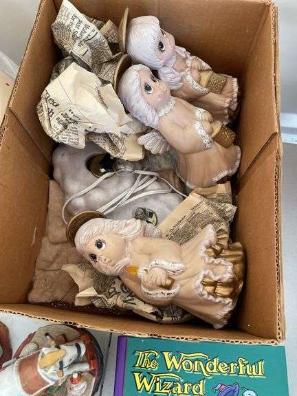 Lighted, angel nativity, pop-up book, doll, music box, figurines, and covered Easter hen.