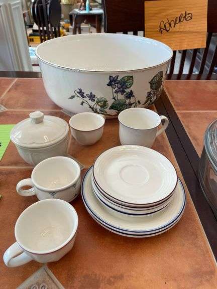 Kitchen. Cookware and Villeroy and Bach, tea, glasses, and saucers.