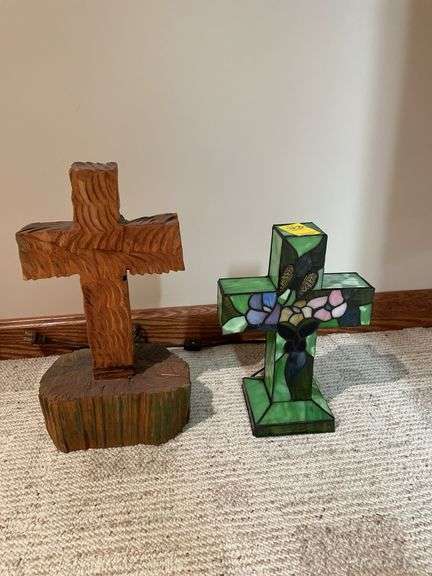 Basement. Two crosses one lights up the other carved from wood. Approximately 12 and 16 inches tall.