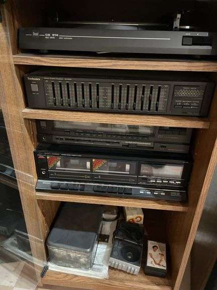 Basement. Vintage audio. Do CS 514. Technics equalizer SH – 8028. Fisher cassette deck. Technics receiver. Fisher speakers. In cabinet with other miscellaneous audio items. Includes wire Eiffel Tower Lamp