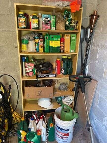 Remaining contents of garden room, not including shelving or wooden ladder. Chemicals, tools, tarps, metal, folding chairs, firewood, kitty pool. Take what you want leave the rest.￼