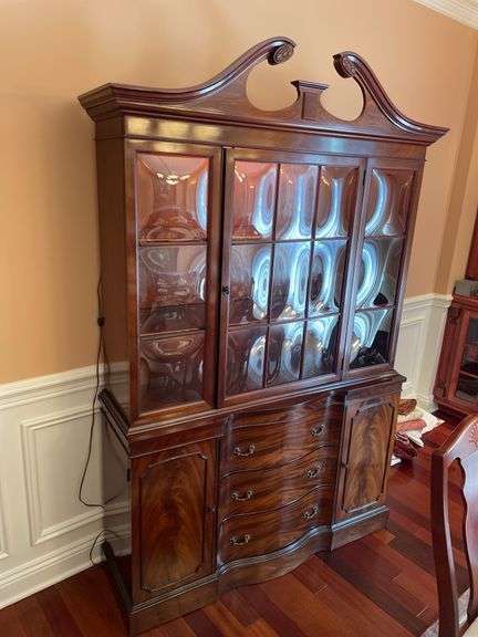 Dining room. Ebert furniture company glass China Cabinet, very high quality. 52 inches wide 80 inches tall. With light inside in good condition Cherrywood finish.